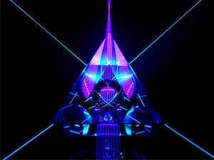 <b>Core Reactor:</b> Created in my closet - which is my "studio". This is my hobby. Setup details: - Magenta fan made with RGB laser projector, going under and then reflected back through triangular pyramid after bouncing off concave mirror.  - Lines going diagonally are 488nm (blue) and 495nm (cyan).